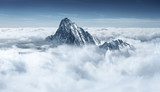Fototapeta Miasta - Mountain in the clouds