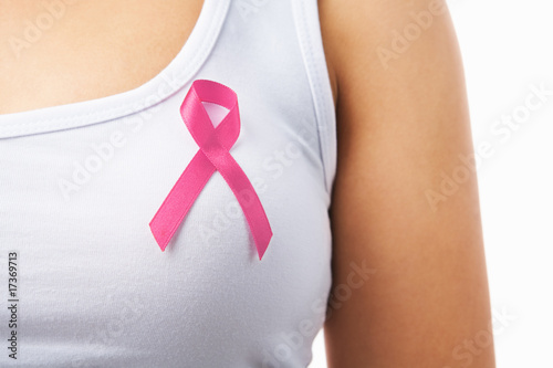 Fotografie, Obraz Pink badge on woman chest to support breat cancer cause