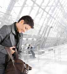 Canvas Print - Businesswoman with laptop bag