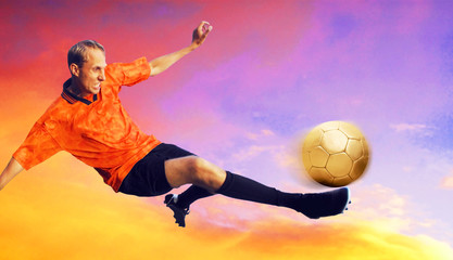 Wall Mural - Shoot of football player on the sky with clouds