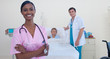 © WavebreakMediaMicro - Smiling Indian nurse with doctor and patient