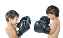 Two Children Are Fighting With Boxing Gloves