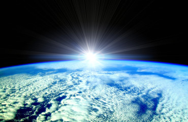 Wall Mural - sun beams over earth horizon