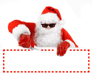 santa claus in shades cutting out an advertising sign