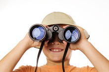 Little Boy Looking Through Binoculars