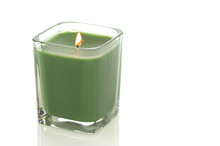 Lit Green Candle On White With Clipping Path