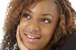 © Monkey Business - Studio Portrait Of Happy Teenage Girl