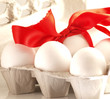 © AB Photography - Egg in box with red bow