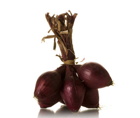 Canvas Print - red onions over white background