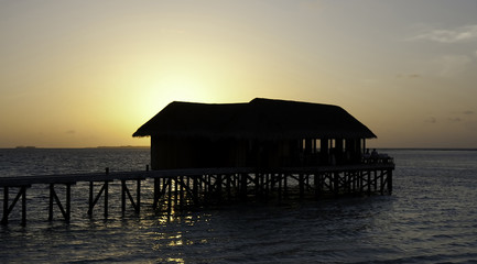 Wall Mural - Maldivian restaurant at sunset, Mirihi, Maldives