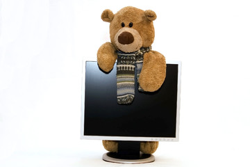 Wall Mural - Teddy Bear and modern silver laptop