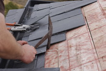 Roofer Made A Roof With Slates