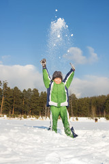 Sticker - Happy child throwing up snow