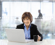 © nyul - Senior businesswoman using laptop
