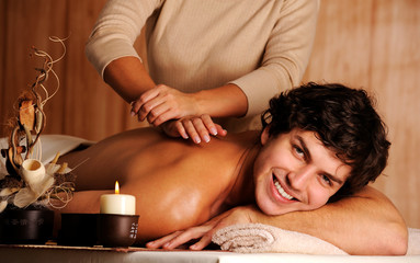 handsome happy young man on massage