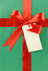 Wall Mural - Gift tag tied with a ribbon