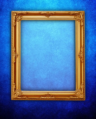 Wall Mural - golden frame on blue wall