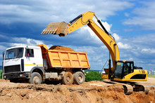 Excavator Loading Dumper Truck