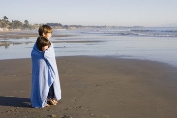 Kids in Blanket at Beach