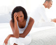 © WavebreakMediaMicro - Upset couple sitting on bed separately