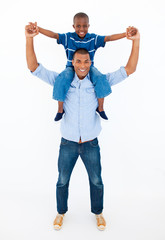 Wall Mural - Dad giving son piggyback ride