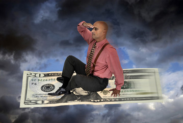 Businessman flying on a dollar bill