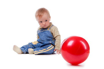 little boy and red ball.