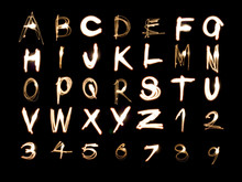 Light Painting Illustration Of The Alphabet And Numbers 1 To 9