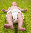 © Morgan - Baby Lying on Green Carpet