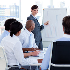 Wall Mural - Self-assured businesswoman making a presentation