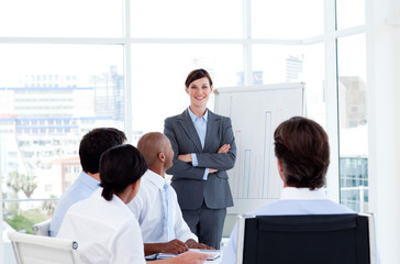 Wall Mural - Confident businesswoman doing a presentation