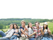 © Morgan - Group of People Relaxing Outdoors With Coffee