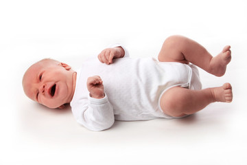 Little boy crying. Isolated on white background