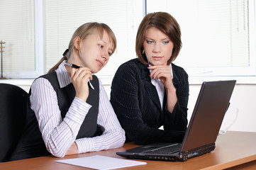 two female in office