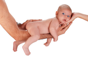 new born baby in parents hands