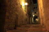 Fototapeta Koty - An alley in the old city of Jerusalem at night, Israel.