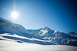 canvas print picture - Wintersonne scheint am Berg im Skigebiet in Ischgl Tirol