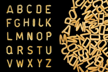 Alphabet soup pasta font. Letters made from kids food.