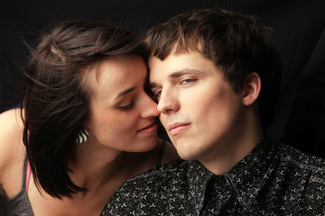 Attractive Couple against a Black Background