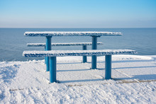 Snowy Picnic Table And Bench Along The Dutch Coast
