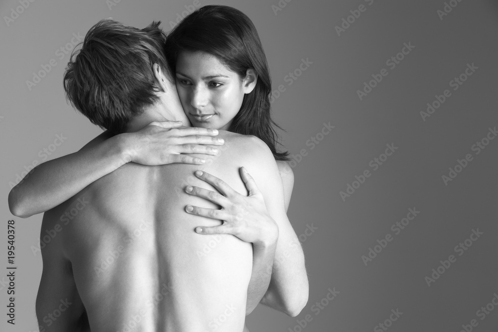 Young Naked Couple Embracing - obrazy, fototapety, plakaty 