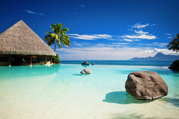 Wall Mural - infinity pool with artificial beach and ocean