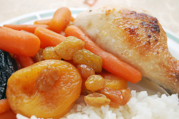 Stewed carrots with dry fruits, rice and chicken