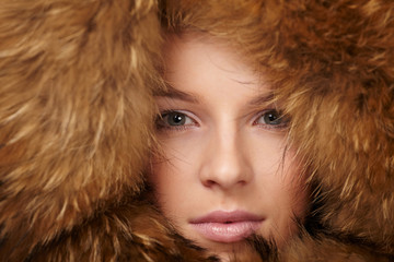 beautiful woman in winter fur coat