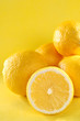 Group of lemon on yellow background