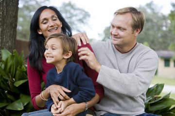 Interracial family with cute five year old son