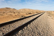Straight Railway In The Desert To The Horizon