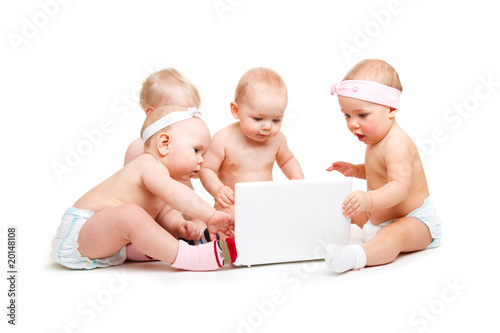 Babies working at laptop © 2xSamara.com