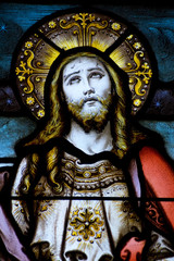 Christ looking to heaven stained glass window