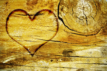 Heart Carved On An Old Wood